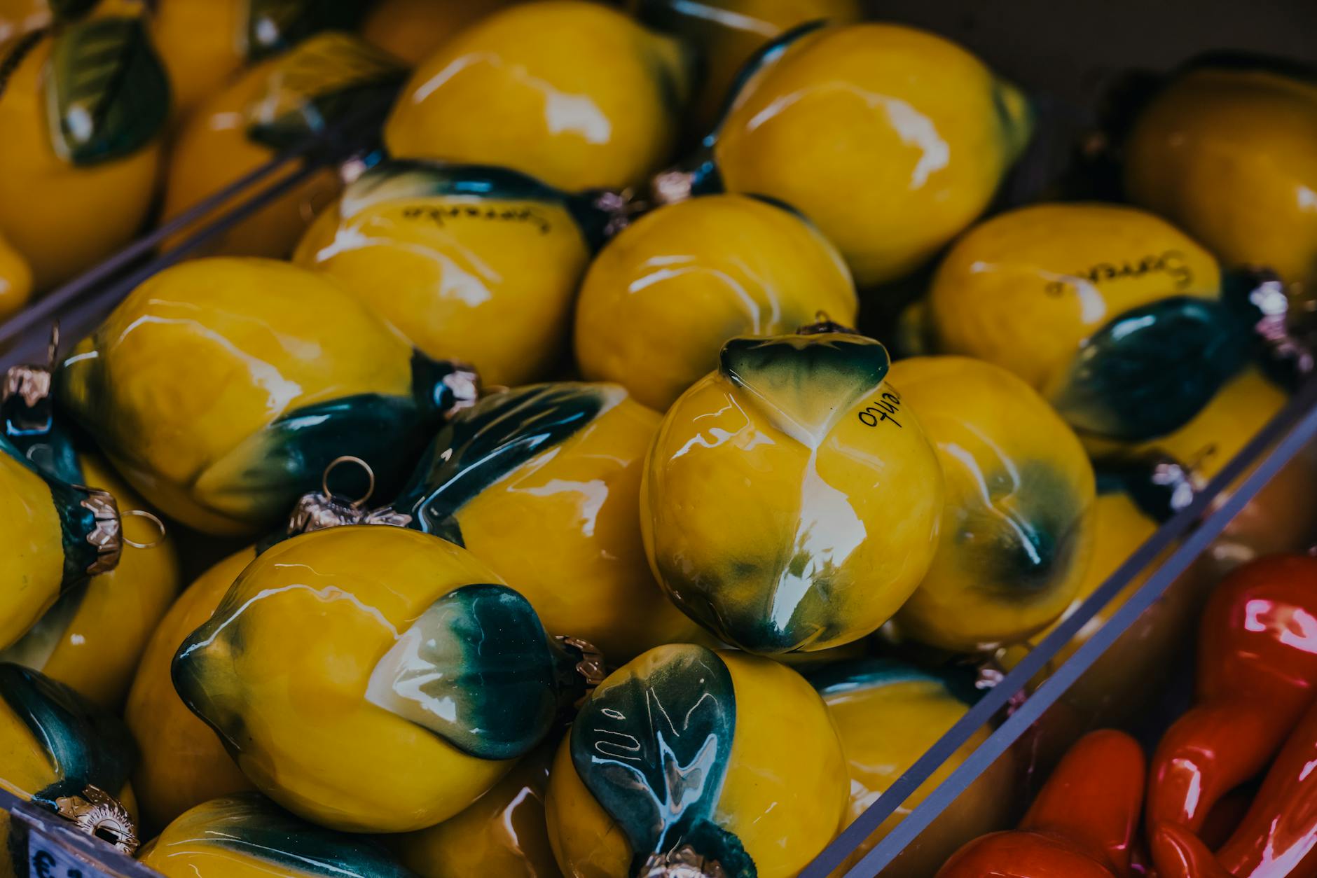 Vibrant yellow ceramic lemons artfully displayed, symbolizing renewed desire and reconnection.